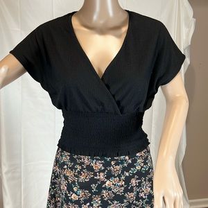 Bar lll black crop top with smocked waistband.